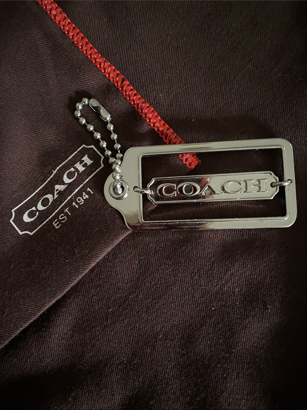 Coach Silver-tone Logo Hang Tag